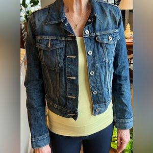 Women’s Levi’s size small red tab 100% cotton denim jacket.